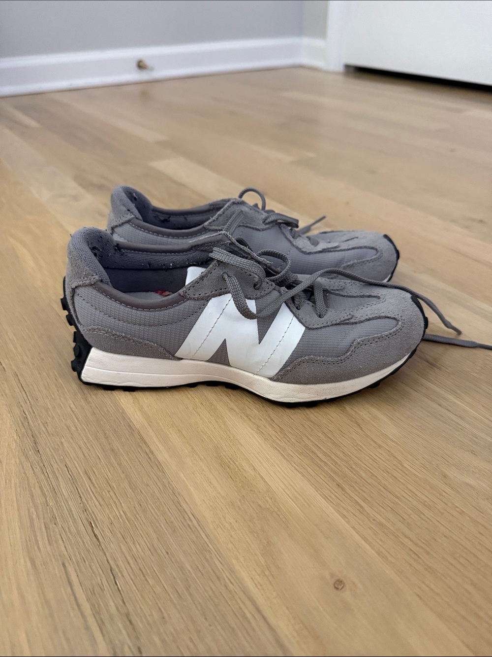 New Balance Kids Gray and White Sneakers